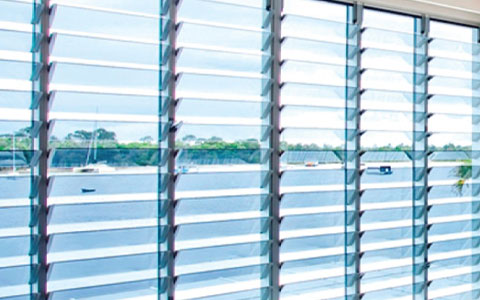 Horizontal glass louvres providing ventilation and natural light.